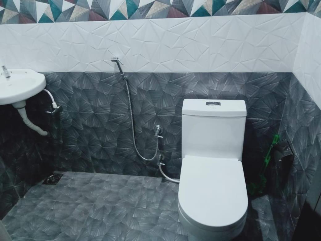 Karma Homestay Mundrothuruth Pokoj fotografie