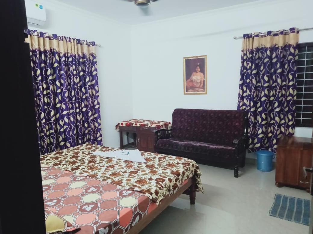 Karma Homestay Mundrothuruth Pokoj fotografie